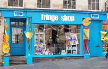Turquoise front of the Edinburgh Fringe Shop on the Royal Mile