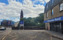 Front of Britannia Hotel, entrance road and woodland below