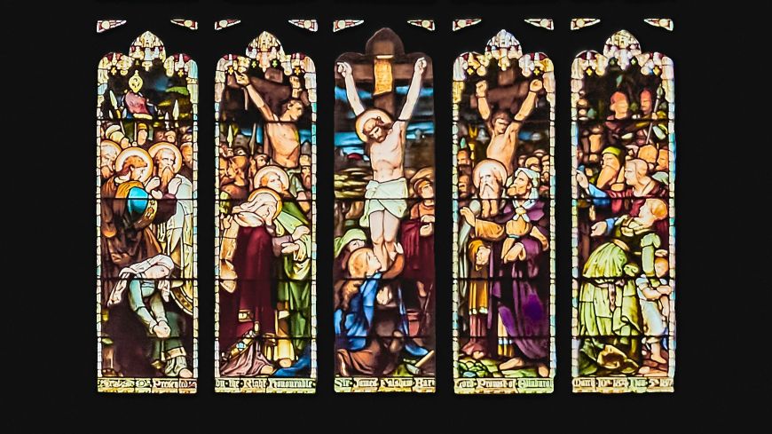 Stain glass window at St Giles Cathedral showing the Crucifixion of Jesus Christ