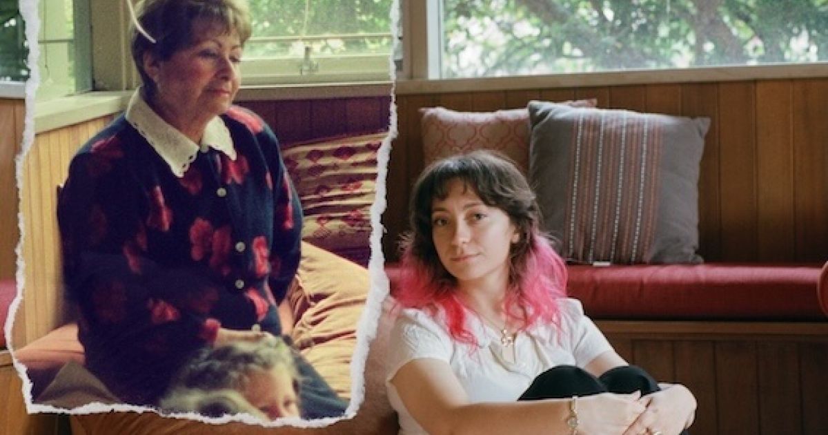 Beth Peterson on the floor on the right, sitting, with her grandmother on a pench, looking at her.